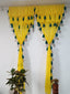 Yellow Sheer Curtain with Green Tassel Detailing