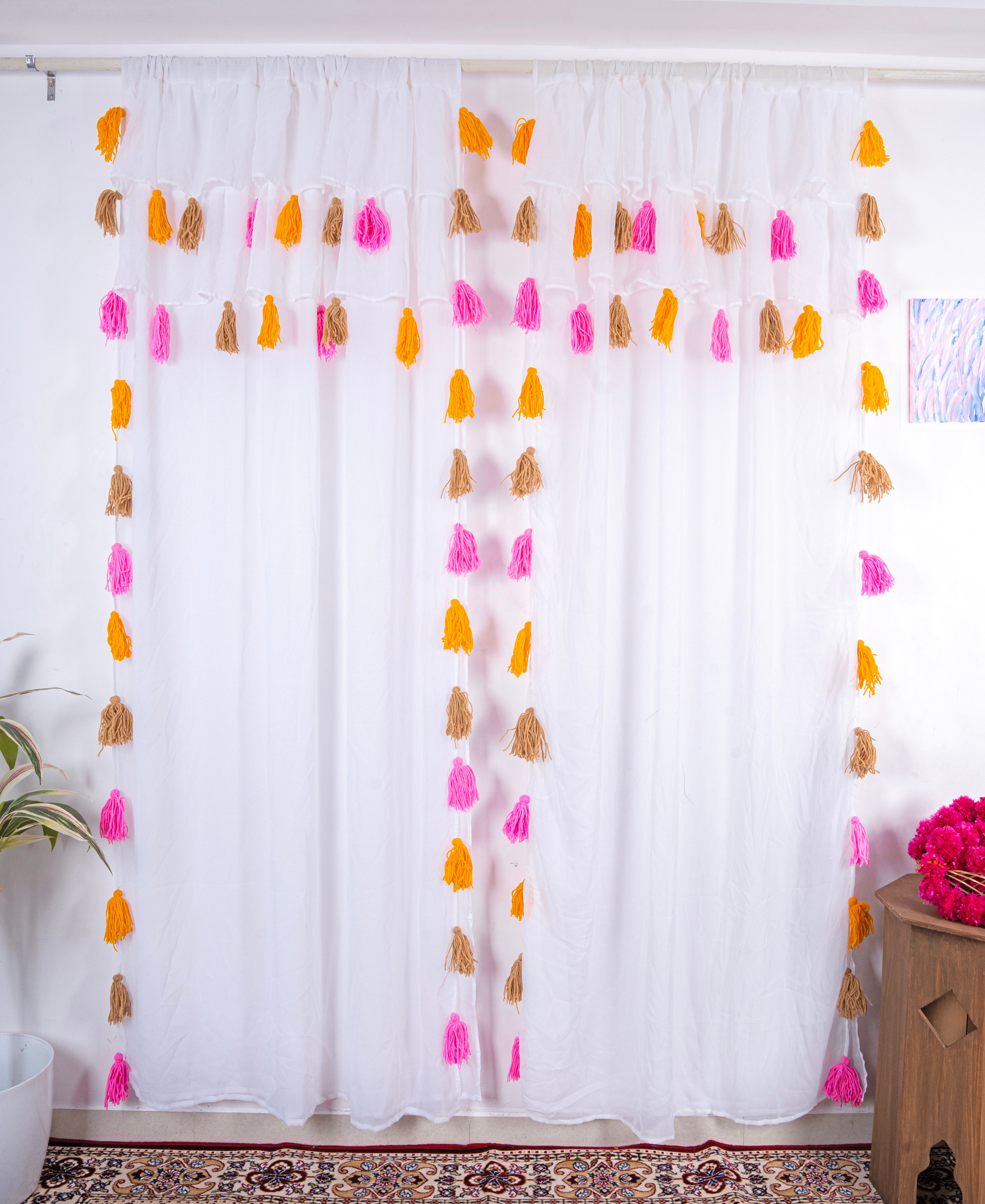 White Sheer Curtain with Pink, Yellow, and Beige Tassel Accents