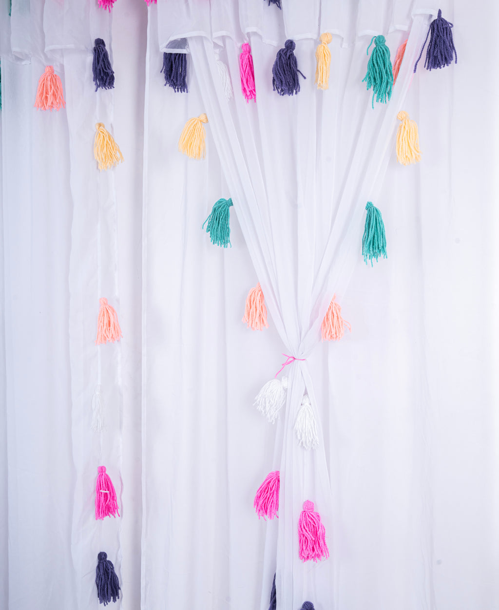 White Sheer Curtain with Multicolor Tassel Detailing