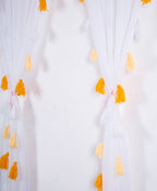 White Sheer Curtain with Yellow and White Tassel Details