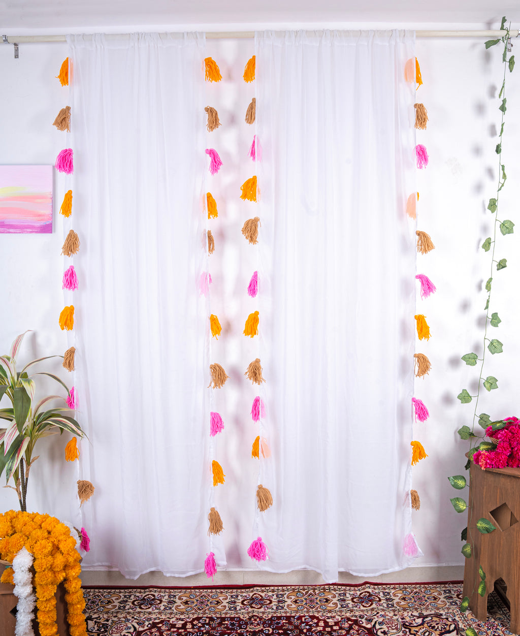 White Sheer Curtain with Pink, Orange, and Brown Tassel Rows