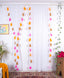White Sheer Curtain with Pink, Orange, and Brown Tassel Rows