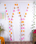 White Sheer Curtain with Pink, Orange, and Brown Tassel Rows