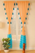 Peach Sheer Curtains with Blue Tassel Accents