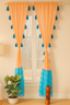 Peach Sheer Curtains with Blue Tassel Accents