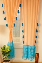 Peach Sheer Curtains with Blue Tassel Accents