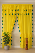 Yellow Sheer Curtain with Green Tassel Detailing