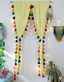 Soft Yellow Sheer Curtain with Multicolor Tassel Edges